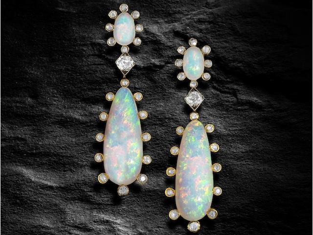A pair of opal and diamond pendent earrings,