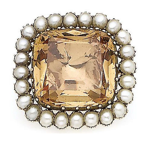 A 19th century topaz and pearl brooch