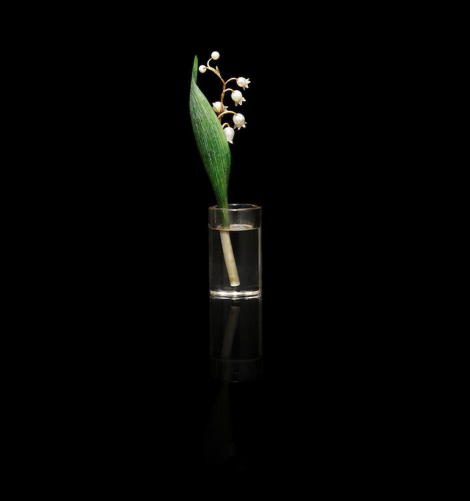 A jewelled gold, nephrite and rock crystal lily of the valley study Faberg&#233;, St. Petersburg, circa 1900 height: 13cm (5 1/8in).