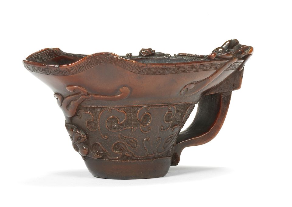 A rhinoceros horn archaistic libation cup 18th century (2)