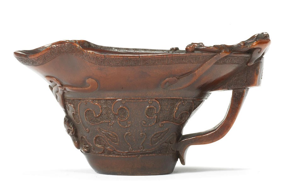 A rhinoceros horn archaistic libation cup 18th century (2)