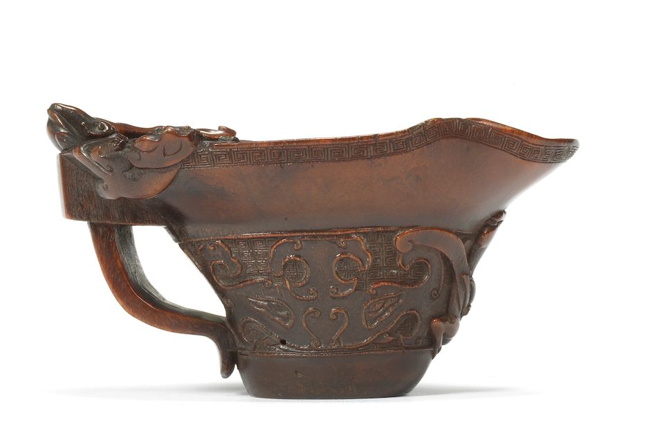 A rhinoceros horn archaistic libation cup 18th century (2)