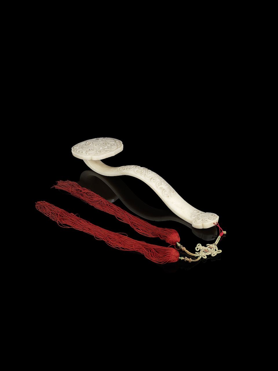 A 'chicken-bone' jade 'Eight Buddhist Emblems' ruyi 19th century