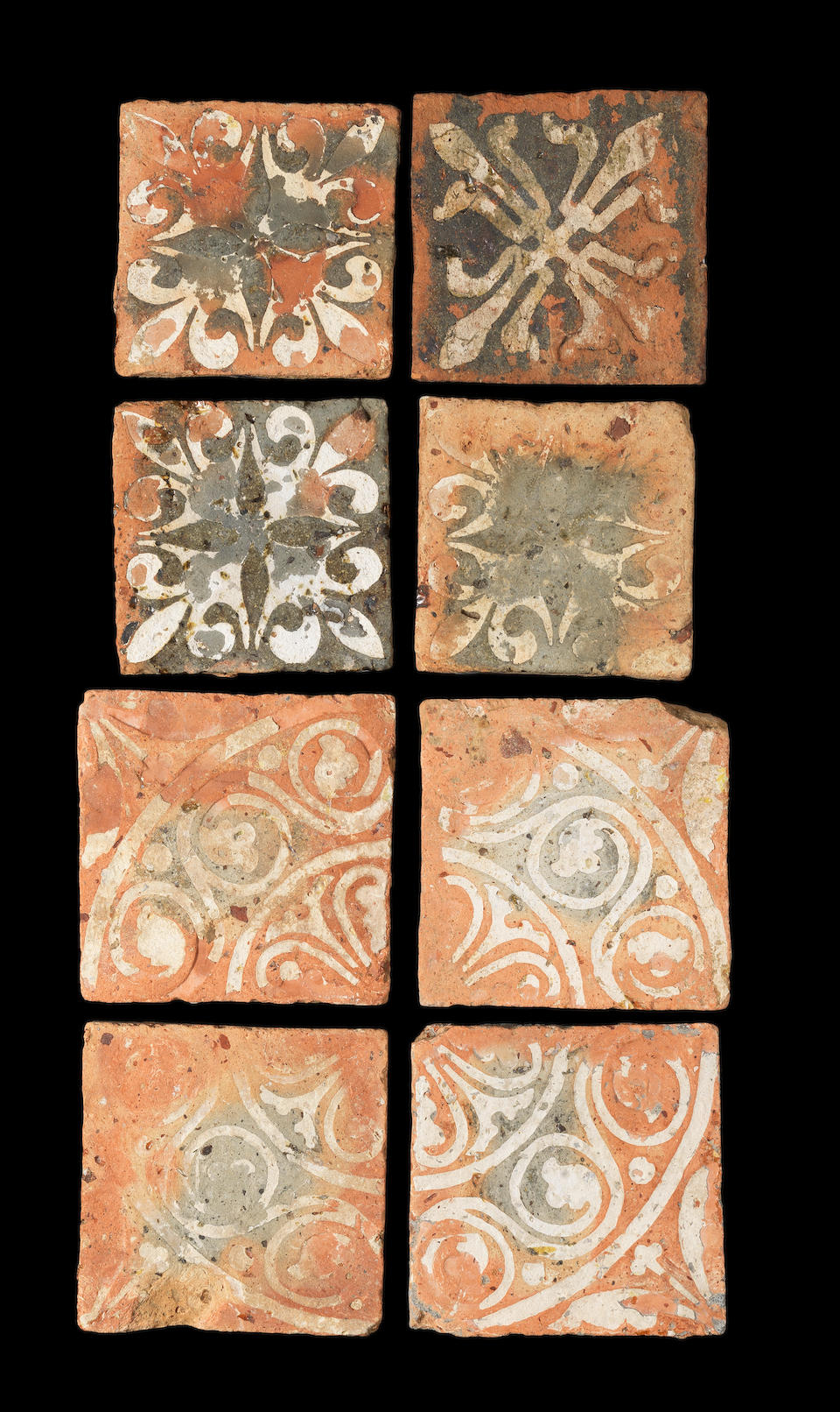 Sixteen French Medieval encaustic floor tiles, 14th-15th century