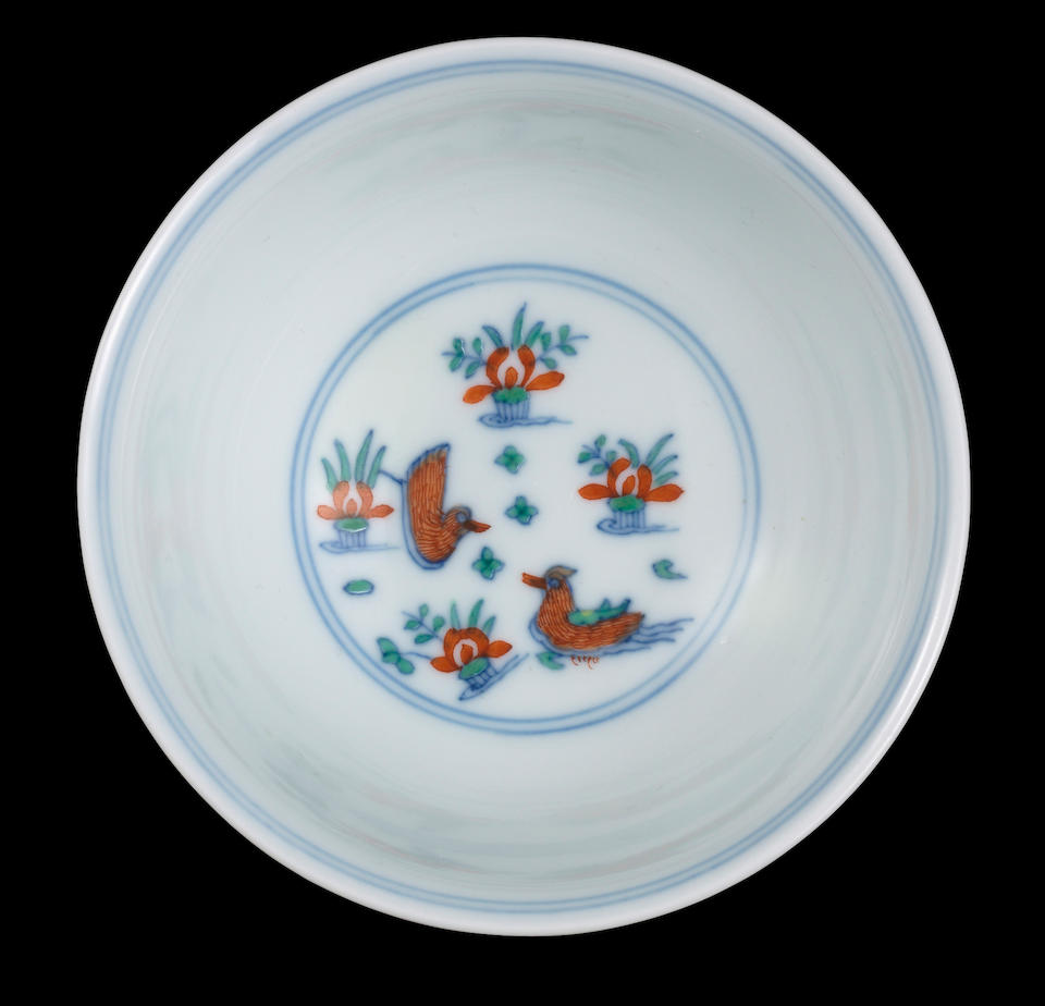 A fine doucai 'lotus pond and mandarin ducks' bowl Qianlong seal mark and of the period