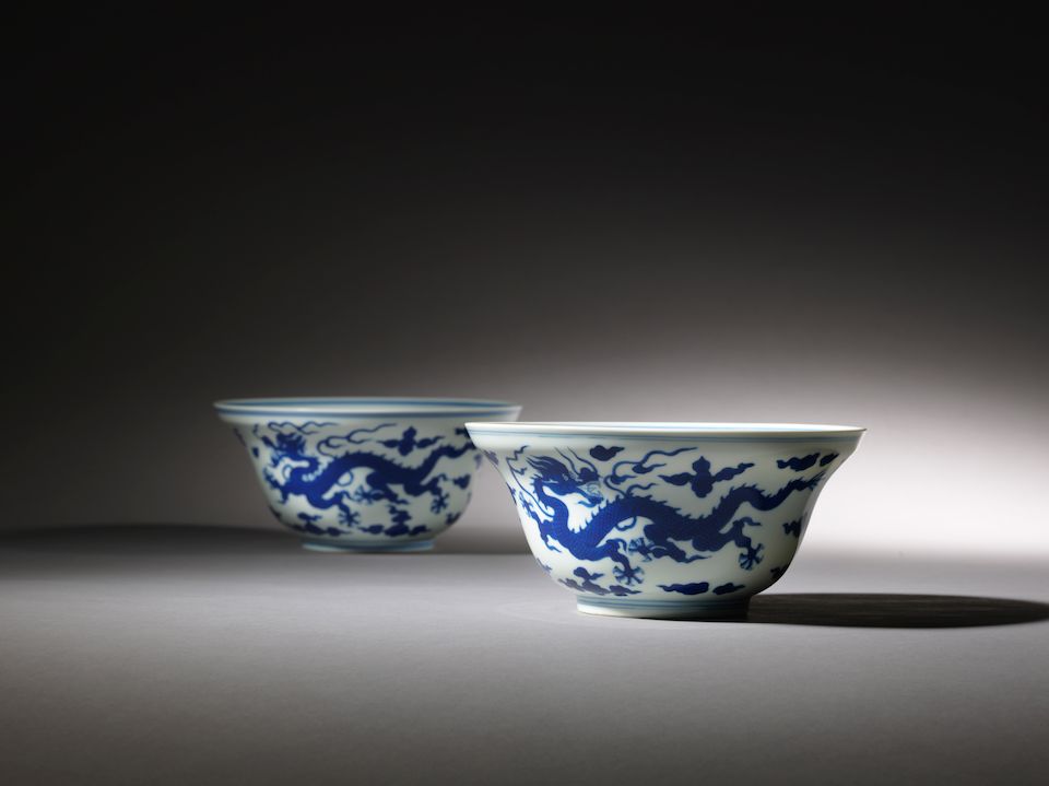 A pair of blue and white ogee-shaped 'dragon' bowls Qianlong seal marks and of the period