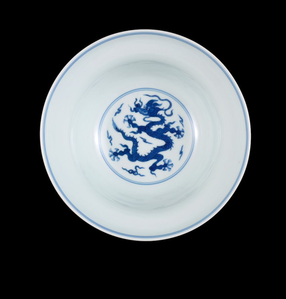 A pair of blue and white ogee-shaped 'dragon' bowls Qianlong seal marks and of the period
