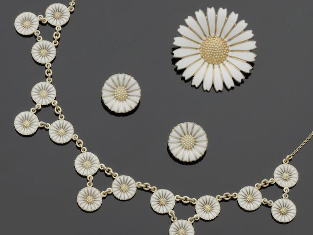 Anton Michelsen: A silver-gilt and white enamel 'Marguerite' necklace and earclips suite (3)