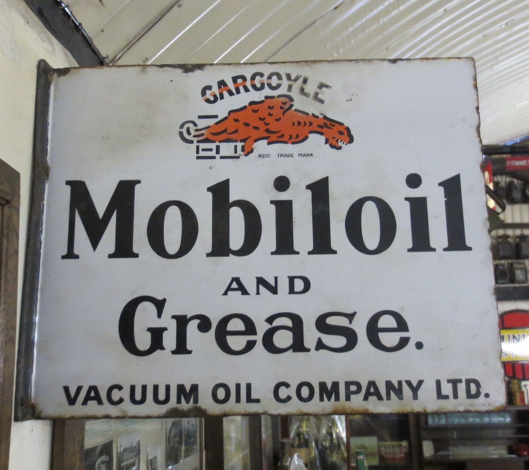 Bonhams Cars : A Mobiloil & Grease enamel sign for the Vacuum Oil Company,