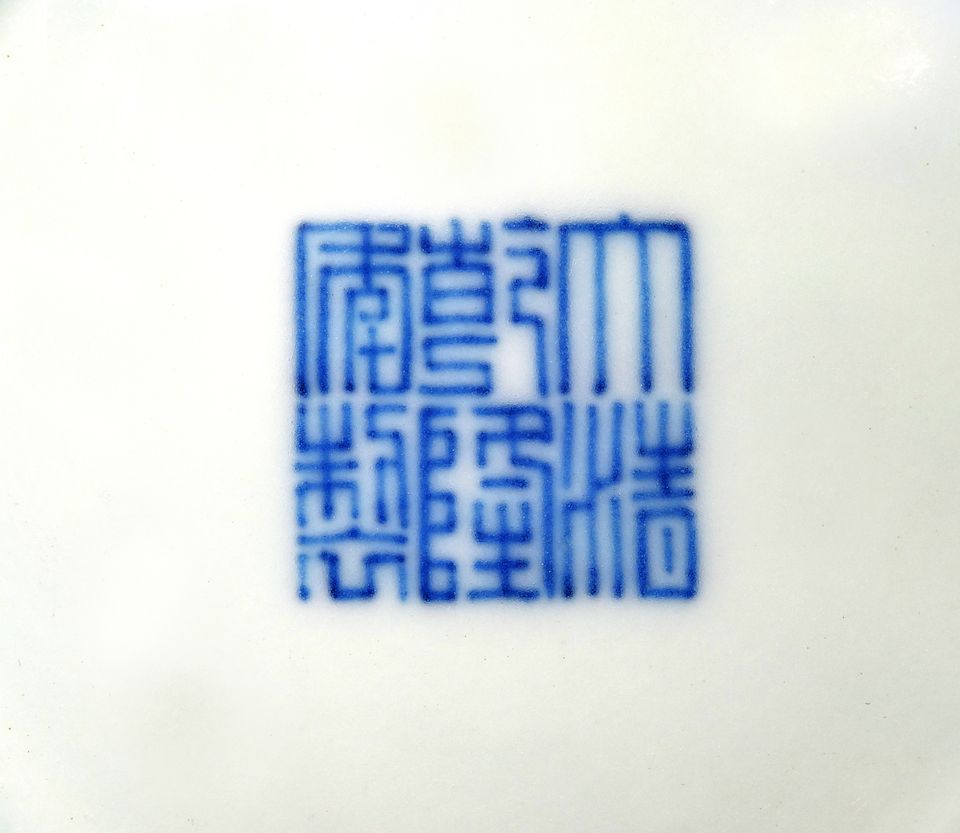 A pair of blue and white ogee-shaped 'dragon' bowls Qianlong seal marks and of the period