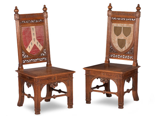 In the manner of A.W.N.Pugin, A pair of Gothic Revival oak hall chairsSecond quarter 19th century, possibly made by J.G. Crace