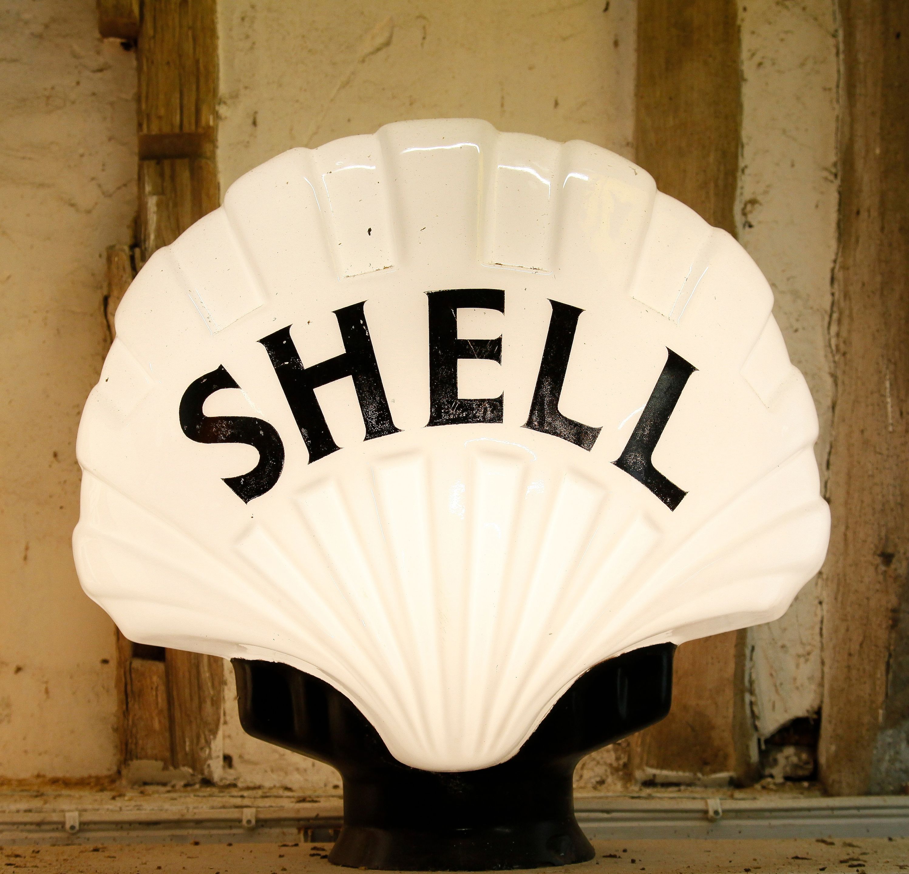 Bonhams Cars : A Shell glass petrol pump globe, 'fat' shell shape,