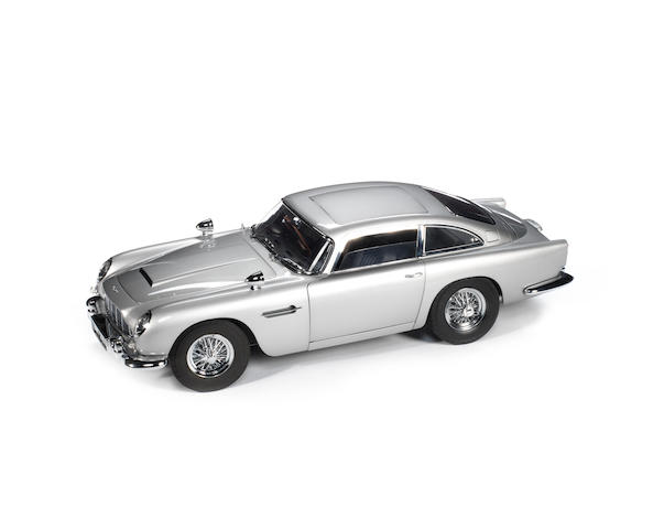 A finely detailed 1:8 scale model of the James Bond 'Goldfinger' Aston Martin DB5,