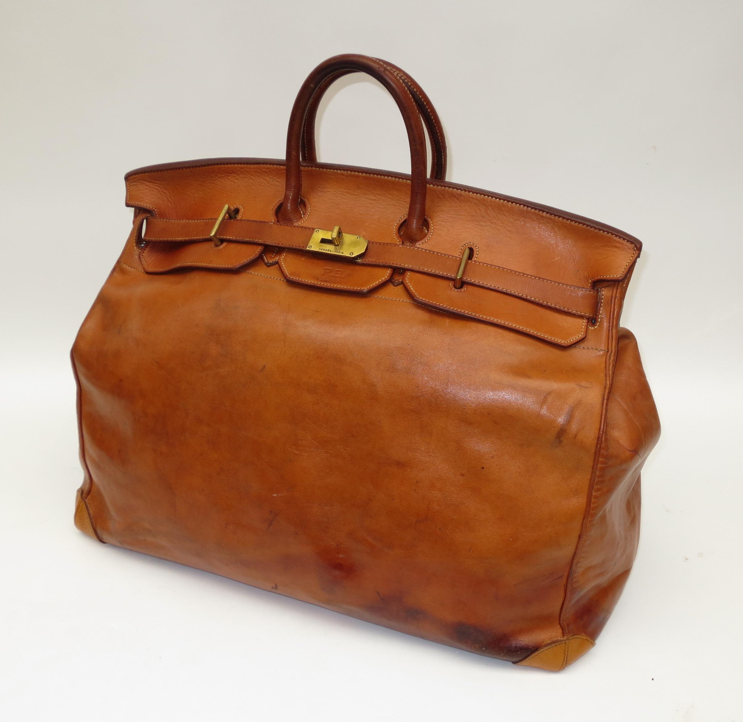 Bonhams Cars : A Hermes 'Haut à Courroies' brown leather bag, circa 1950