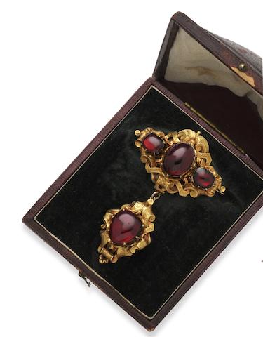 Bonhams : A Victorian garnet set brooch