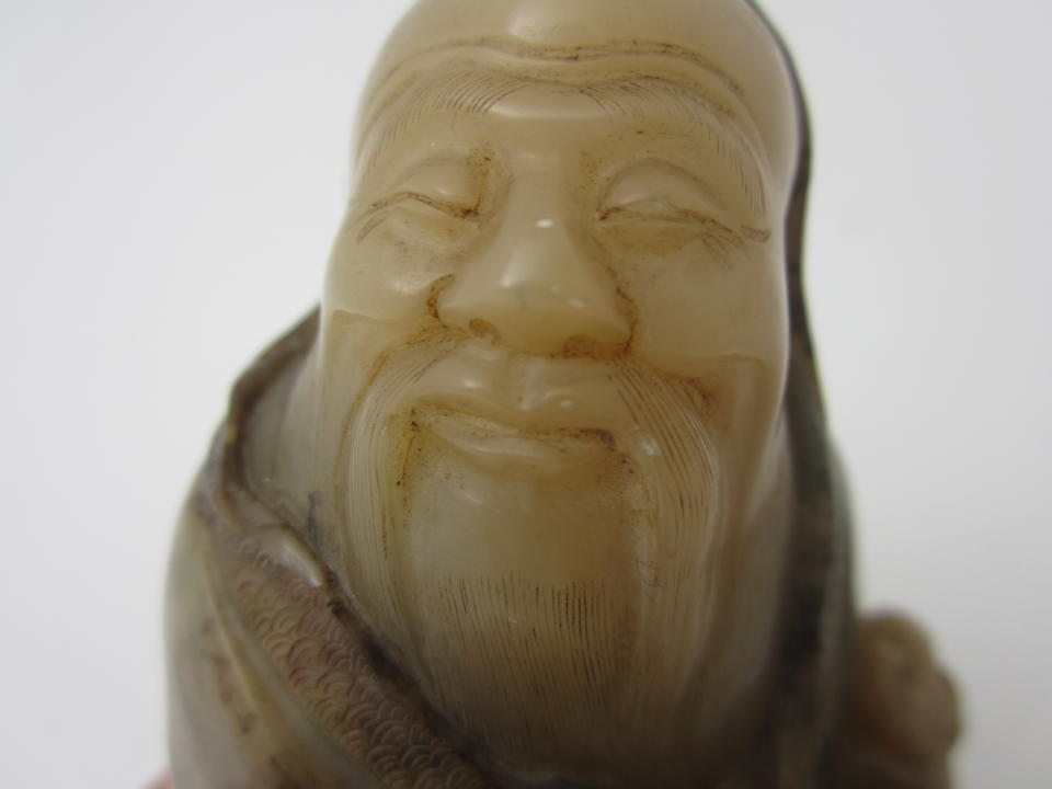 A soapstone figure of a Luohan 19th century