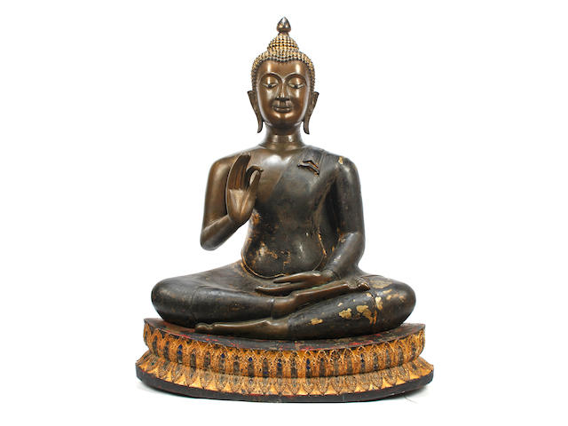 A large bronze figure of Buddha