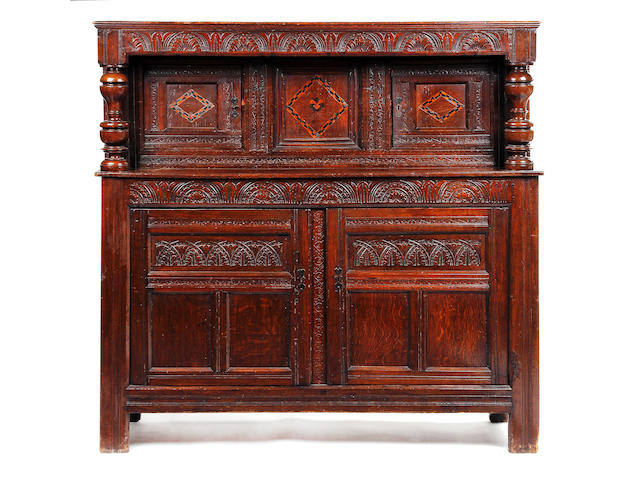 A mid-17th century oak and inlaid court cupboard, Derbyshire/Yorkshire, circa 1660