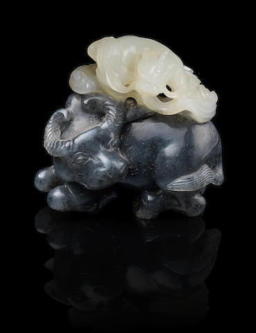 A black and white jade carving of a water buffalo and a qilin 18th/19th century (2)