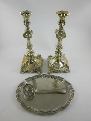 A 19th century white metal and silver gilt pair of candlesticks no marks evident  (4)