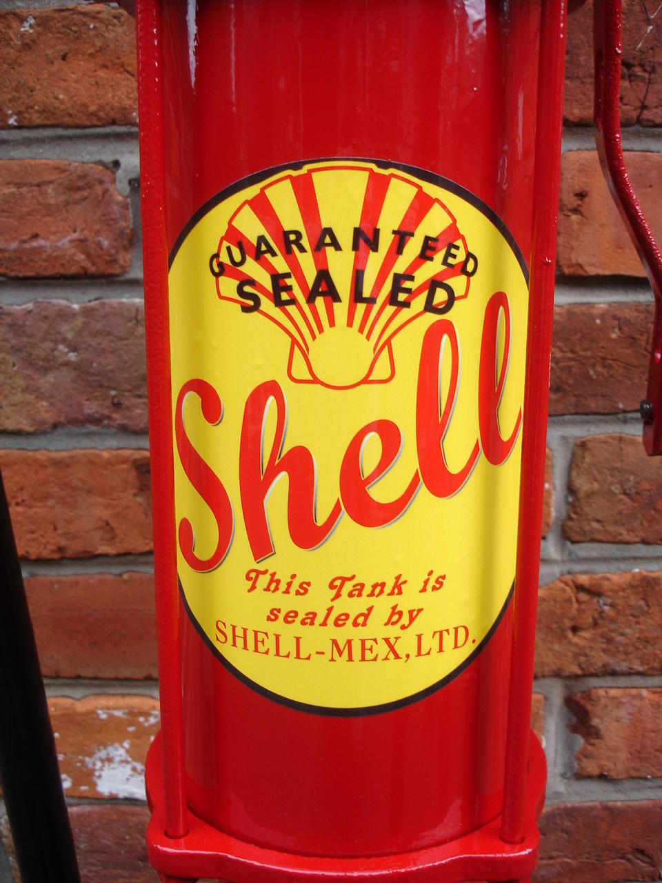An unusual small hand-operated one gallon petrol pump by Bennett,