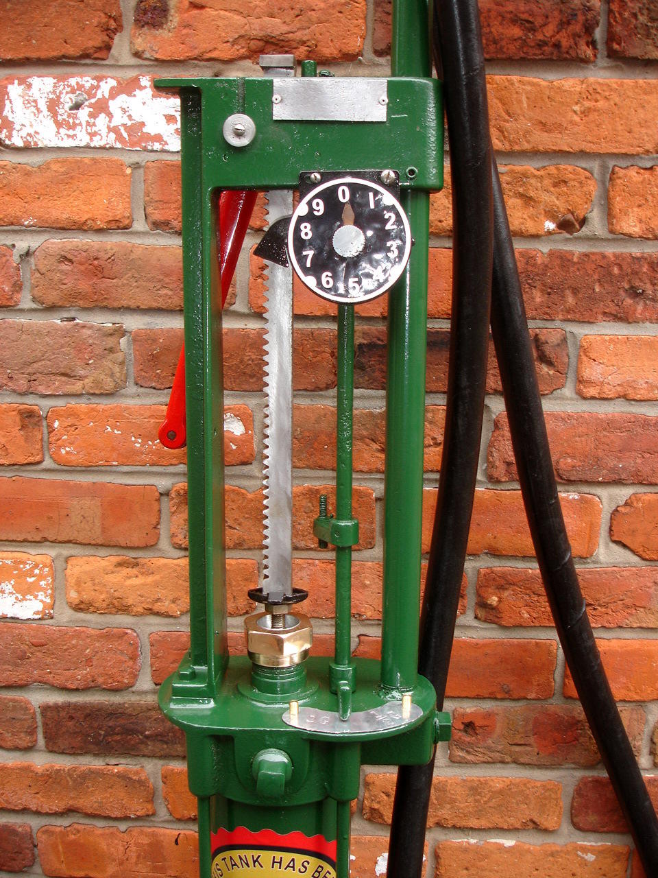 An early one gallon petrol pump manufactured by Wayne Tank & Pump Co Ltd,