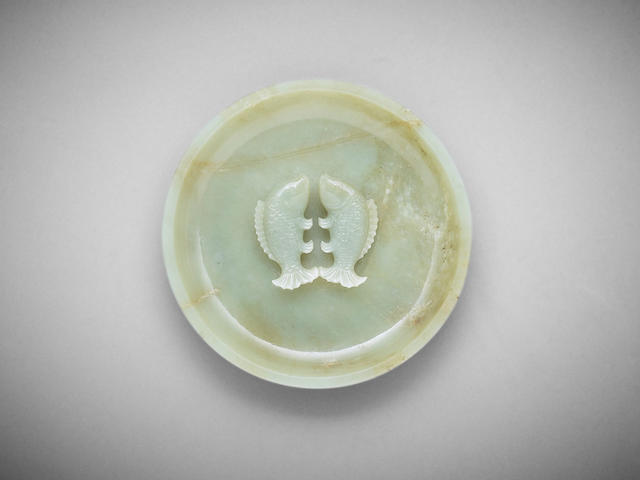 A Chinese carved celadon-jade marriage bowl Qianlong four-character incised seal mark to the base, Qing dynasty