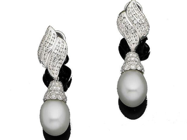 A pair of cultured pearl and diamond pendent earrings