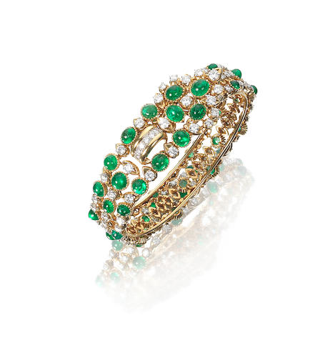 An emerald and diamond bangle, by Cartier,