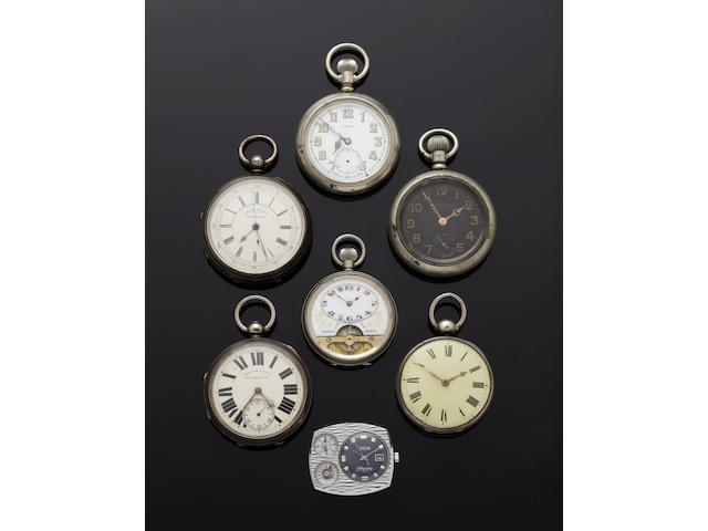 A collection of pocket watches and wristwatches