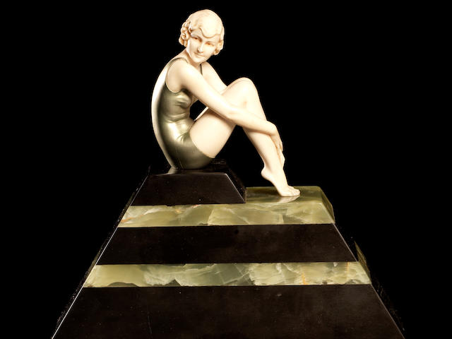 Ferdinand Preiss (German, 1892-1943) 'Bather Seated' an Art Deco Carved Ivory and Patinated Bronze Study, circa 1925