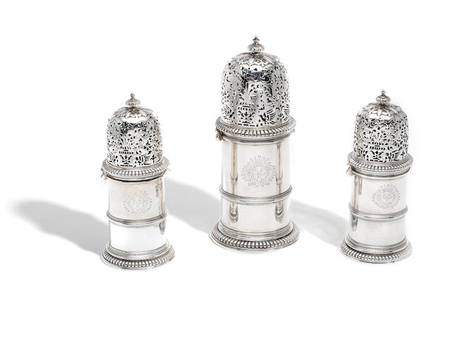 A suite of three late 17th century silver casters stamped twice with maker's mark of D G beneath a fleur-de-lys, for Daniel Garnier (I) last quarter of 17th century (3)