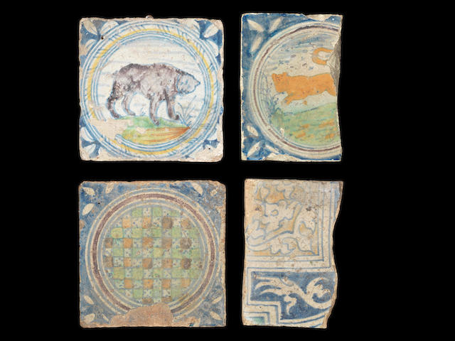 Two Early Delftware paving tiles and two fragments, circa 1580-1620