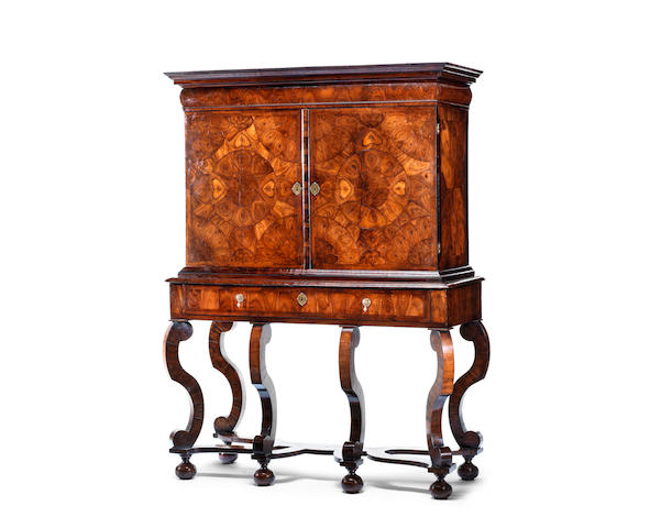 A William and Mary kingwood oyster veneered and rosewood cabinet on stand
