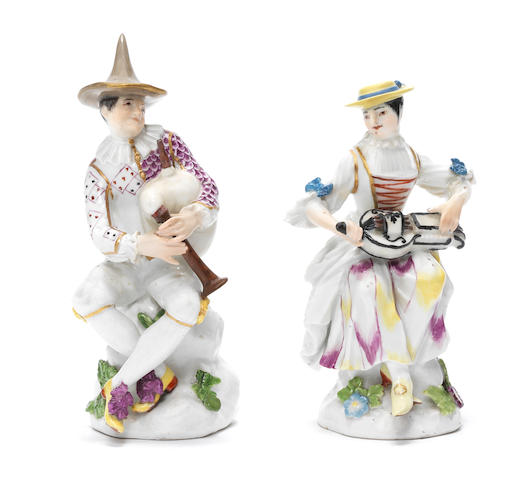 A pair of Meissen figures of Columbine and Harlequin playing instruments, circa 1745