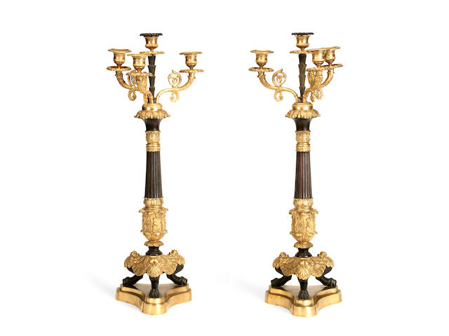 A pair of Restauration Period gilt and patinated bronze four light candelabra (2)
