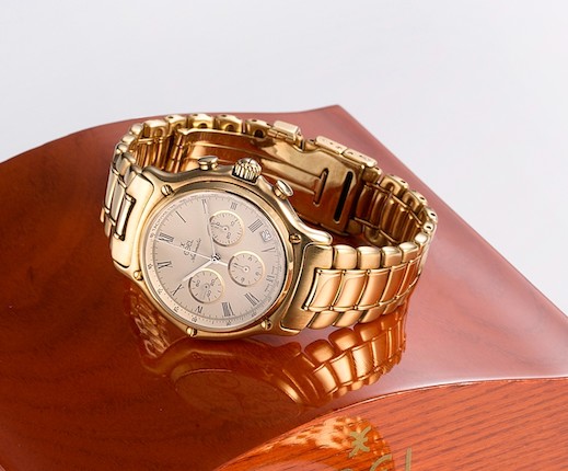 Bonhams : Ebel. An 18K gold automatic calendar chronograph bracelet ...