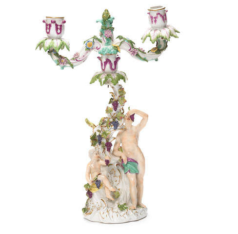 A Meissen two-arm figural candelabrum emblematic of Autumn, circa 1750