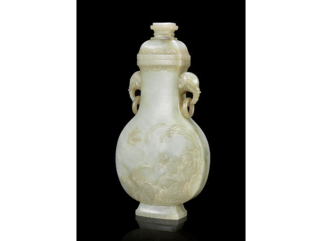 An Imperial very pale green jade 'swallow and lotus' vase and cover Qianlong six-character fang gu mark and of the period  (2)