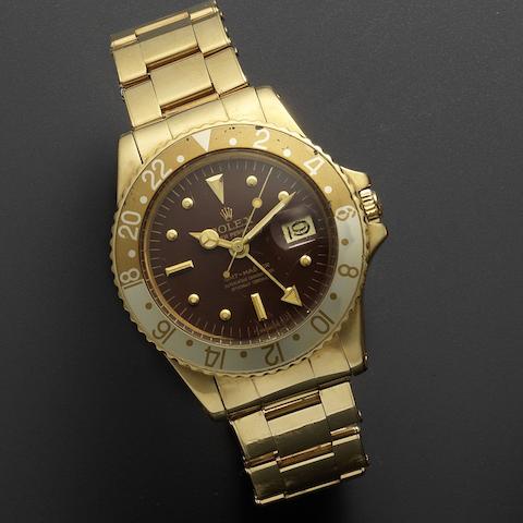 Rolex. A fine 18ct gold automatic dual time bracelet watch GMT-Master, Ref:1675, Serial No.312****, Circa 1972