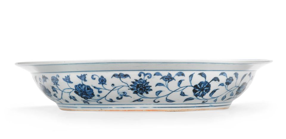 A rare large blue and white 'floral scroll' dish Yongle