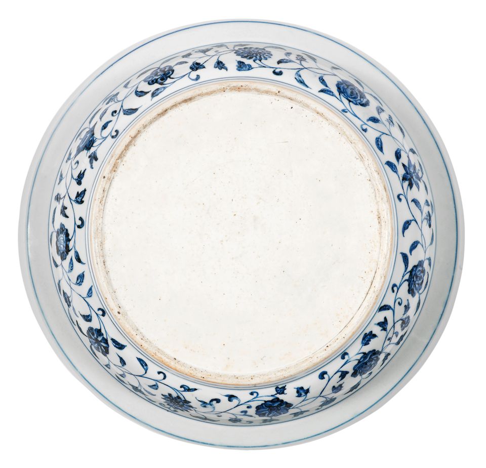 A rare large blue and white 'floral scroll' dish Yongle
