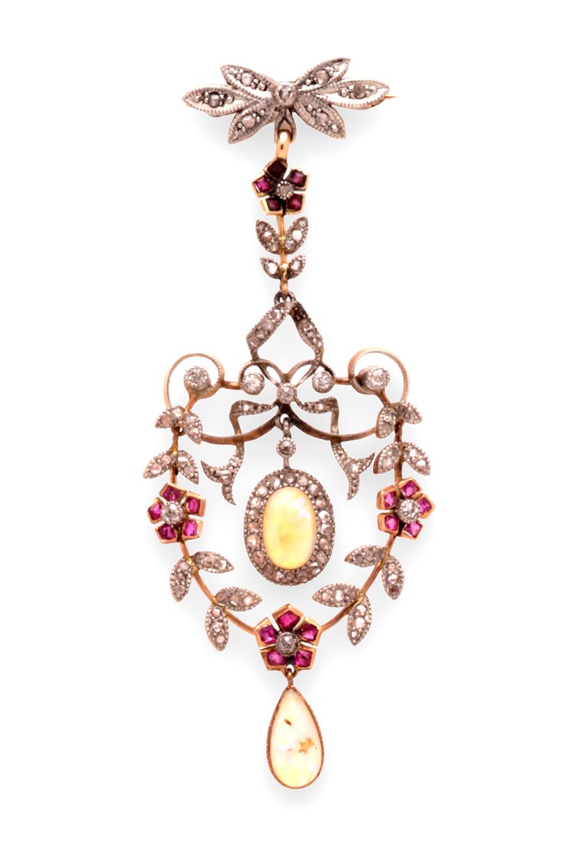 An opal, ruby and diamond brooch