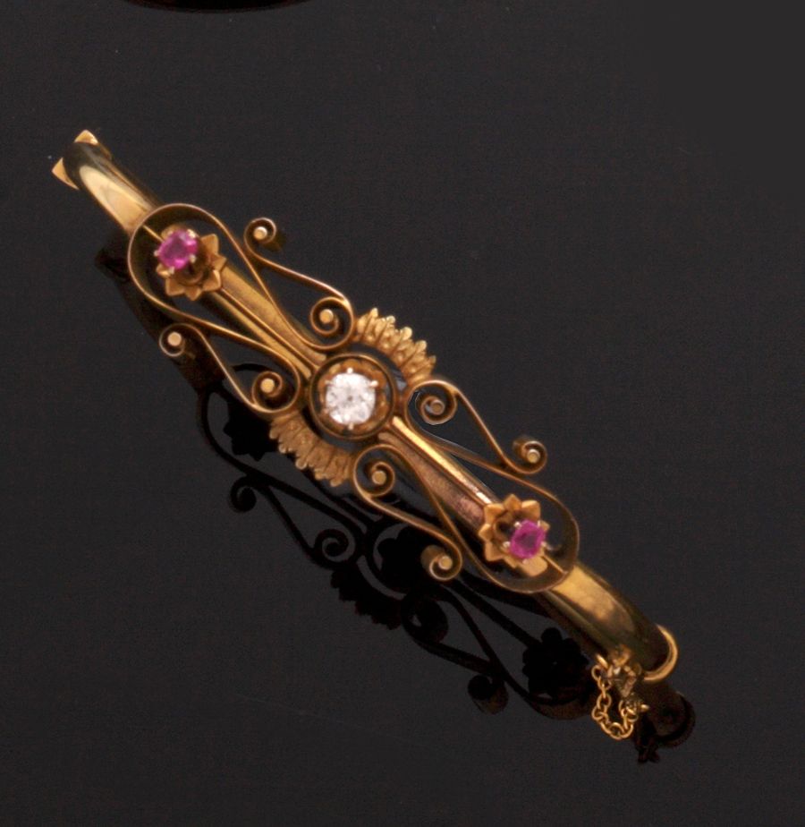 A ruby and diamond set bangle