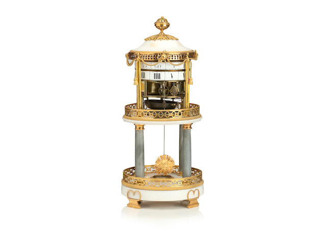A Louis XVI ormolu mounted white and grey marble rotating drum clockWith applied brass plaque Coliau, Paris