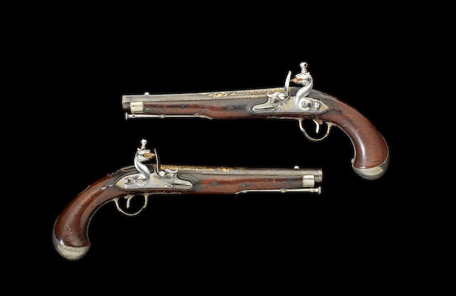 Bonhams A Pair Of Silver Mounted Flintlock Pistols With