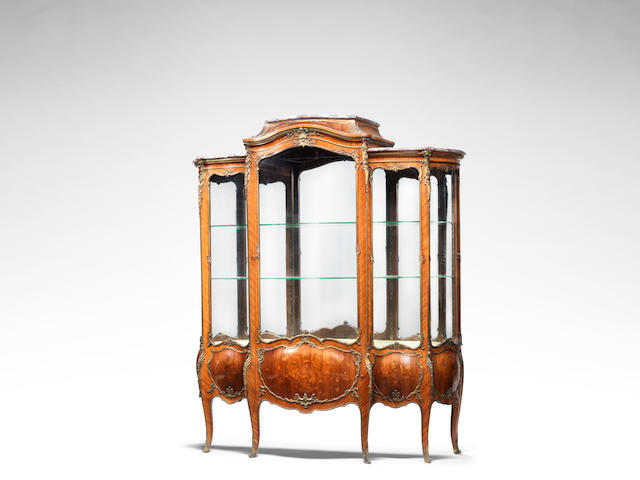 A French late 19th/ early 20th century Louis XV style ormolu-mounted kingwood, tulipwood and marquetry bomb&#233; vitrine  by Fran&#231;ois Linke, Paris, index number 76