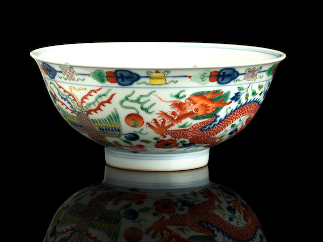 A wucai 'dragon and phoenix' bowl  Qianlong seal mark and of the period