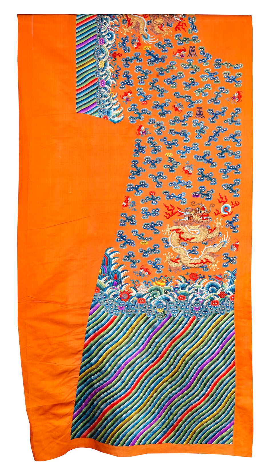 An uncut silk 'Twelve Symbols' apricot yellow-ground robe Late 19th century