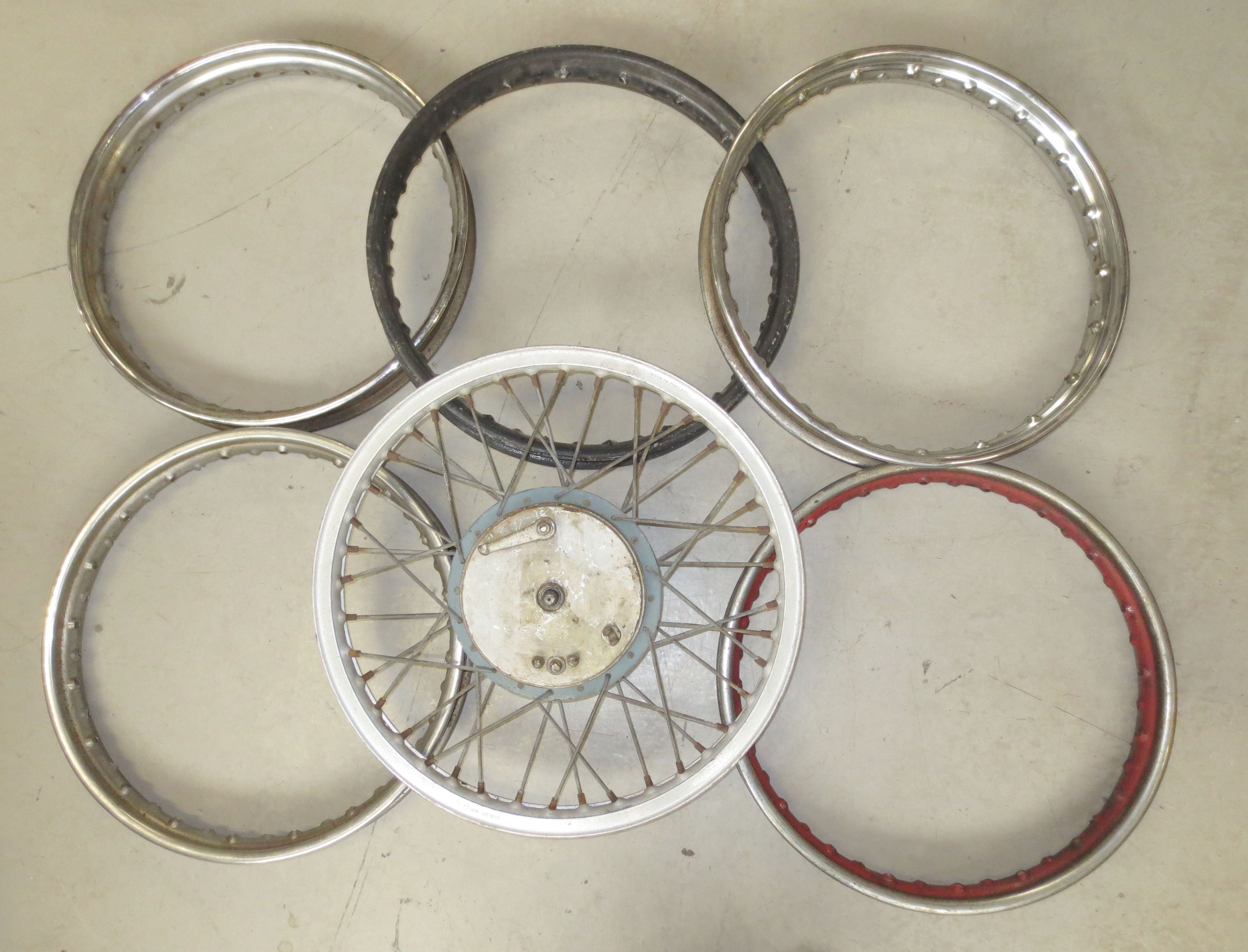 Bonhams Cars : Six Triumph wheel rims, ((6))